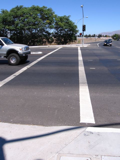 Crosswalk across Central, at DeLaCruz.
