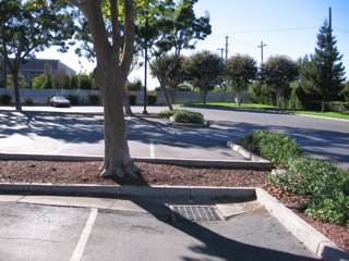 BAE has back fence preventing walking through parking lot.
